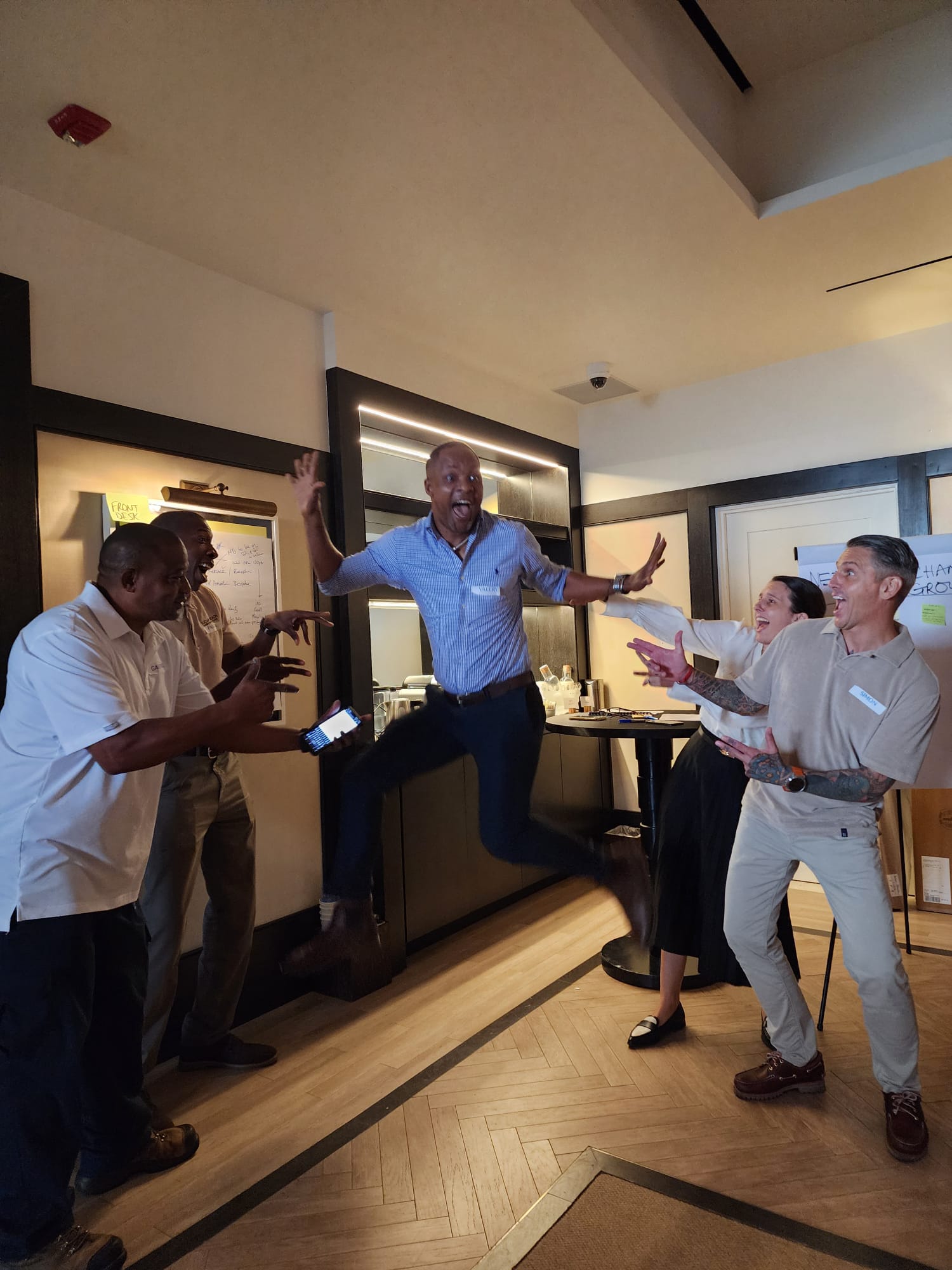 Leadership team celebrating during an energizer activity